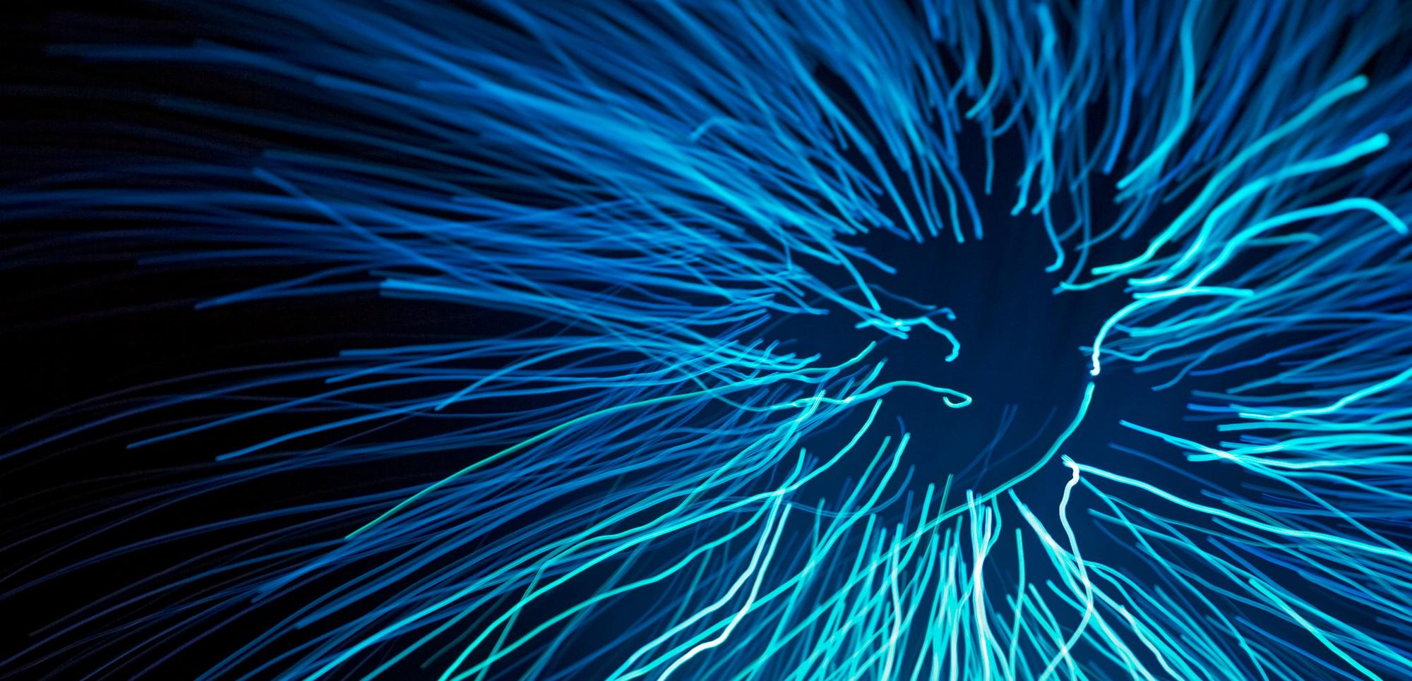Transforming the darkness. Illustration of beams of light against a dark background.