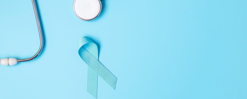 Blue ribbon and stethoscope on blue background, Prostate cancer Awareness month