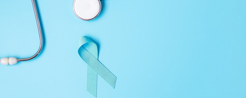 Blue ribbon and stethoscope on blue background, Prostate cancer Awareness month