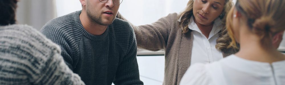 Support, help and therapy group of people in circle for mental health problem, depression or anxiet