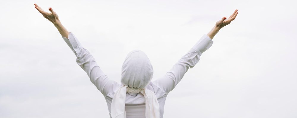 woman with white headscarf, has cancer